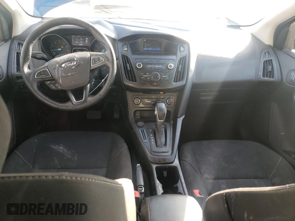 2018 Ford Focus SE z VIN 1FADP3F2XJL327387, wystawiony jako Copart lot #46927835 z przebiegiem 61 707 mil mil oraz Szkoda całkowita • Salvage title. Historia ofert i sprzedaży dostępna na DreamBid. Obrazek 8.