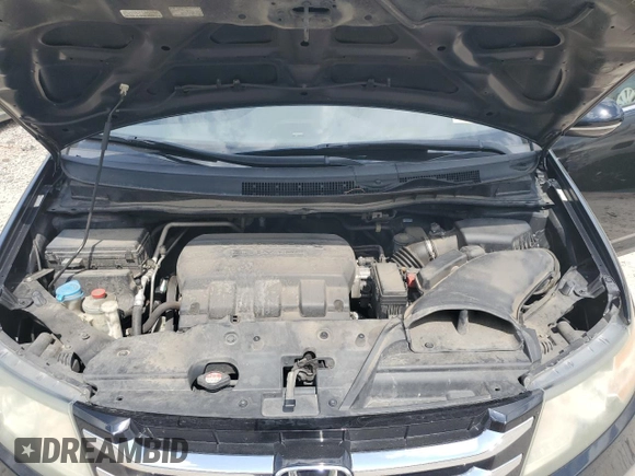 2016 Honda Odyssey Touring Elite with VIN 5FNRL5H97GB038917, listed as a Copart auction lot 54479375 with 165,432 mi miles and Salvage Title. Bid and sale history available at DreamBid. Image 12.