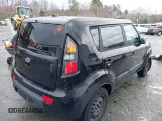 2011 Kia Soul with VIN KNDJT2A12B7303712, listed as a IAAI auction lot 41629793 with 127,167 mi miles. Bid and sale history available at carsss.com. Image 4.