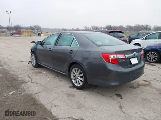 2014 Toyota Camry Hybrid LE with VIN 4T1BD1FK6EU112308, listed as a IAAI auction lot 41175963 with 116,557 mi miles. Bid and sale history available at carsss.com. Image 3.