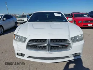 2014 Dodge Charger SXT with VIN 2C3CDXHG2EH104640, listed as a IAAI auction lot 41379760 with 122,664 mi miles and . Bid and sale history available at DreamBid. Image 12.