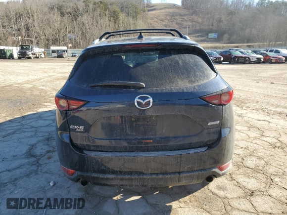 2018 Mazda CX-5 Grand Touring with VIN JM3KFBDM8J0399975, listed as a Copart auction lot 45998115 with 98,037 mi miles and Salvage Title. Bid and sale history available at DreamBid. Image 6.