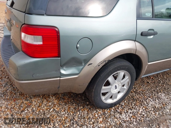 2005 Ford Freestyle SE with VIN 1FMZK01195GA74424, listed as a IAAI auction lot 41671994 with 238,292 mi miles. Bid and sale history available at carsss.com. Image 6.