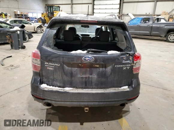 2014 Subaru Forester with VIN JF2SJHLC8EH492751, listed as a Copart auction lot 85634954 with 176,328 mi miles and Salvage title. Bid and sale history available at DreamBid. Image 6.