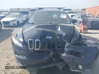 2015 Jeep Cherokee Latitude with VIN 1C4PJLCB9FW683459, listed as a IAAI auction lot 41998309 with 176,769 mi miles and . Bid and sale history available at carsss.com. Image 12.