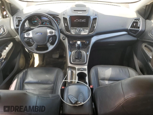 2013 Ford Escape SEL with VIN 1FMCU9H94DUA50063, listed as a Copart auction lot 63008005 with 225,421 mi miles and Salvage title. Bid and sale history available at DreamBid. Image 8.