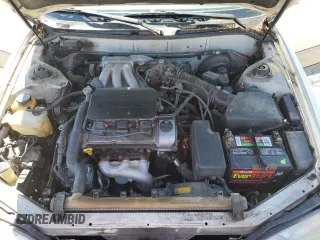 1996 Toyota Camry LE z VIN JT2BF12K5T0172341, wystawiony jako Copart lot #53384845 z przebiegiem 308 235 mil mil oraz Szkoda całkowita • Salvage title. Historia ofert i sprzedaży dostępna na DreamBid. Obrazek 11.