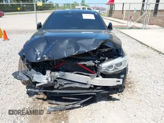 2016 BMW 4 Series 428i with VIN WBA3N7C55GK227677, listed as a IAAI auction lot 42048025 with 82,078 mi miles and . Bid and sale history available at carsss.com. Image 6.