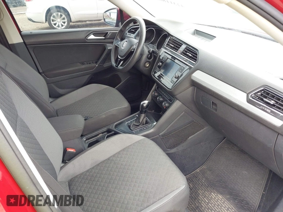 2018 Volkswagen Tiguan S with VIN 3VV1B7AX3JM045193, listed as a IAAI auction lot 42311886 with 69,049 mi miles and . Bid and sale history available at DreamBid. Image 5.