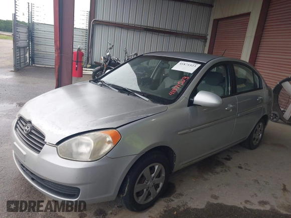 2009 Hyundai Accent Auto GLS with VIN KMHCN46C99U349778, listed as a IAAI auction lot 41871523 with 140,012 mi miles. Bid and sale history available at carsss.com. Image 2.