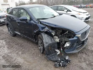 2017 Mazda CX-3 Grand Touring with VIN JM1DKFD75H0179167, listed as a IAAI auction lot 41980243 with 69,076 mi miles. Bid and sale history available at carsss.com. Image 1.
