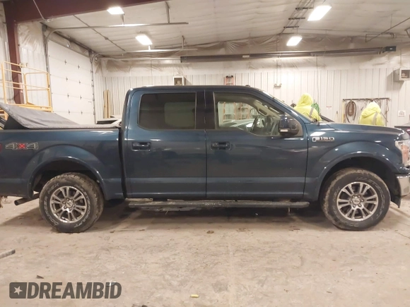 2018 Ford F-150 XL with VIN 1FTEW1EP4JFA00923, listed as a IAAI auction lot 41506293 with 153,523 mi miles and . Bid and sale history available at DreamBid. Image 13.