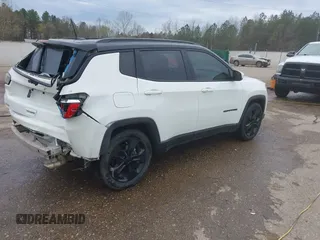 2020 Jeep Compass Latitude with VIN 3C4NJCBB9LT118042, listed as a IAAI auction lot 41811634 with 62,717 mi miles and . Bid and sale history available at carsss.com. Image 4.