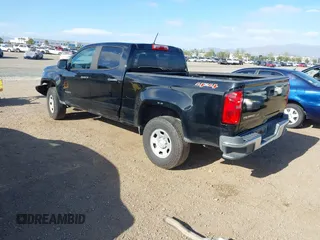 2020 Chevrolet Colorado 4WD Work Truck z VIN 1GCGTBENXL1212795, wystawiony jako IAAI lot #42249330 z przebiegiem 46 900 mil mil oraz . Historia ofert i sprzedaży dostępna na DreamBid. Obrazek 3.
