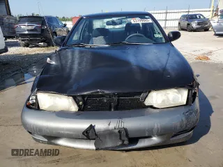1999 Nissan Sentra XE с VIN 3N1AB41D5XL085943, выставлен на аукционе Copart как лот 63199065 с пробегом 167 555 миль миль и Списание • Salvage title. История ставок и продаж доступна на DreamBid. Изображение 5.