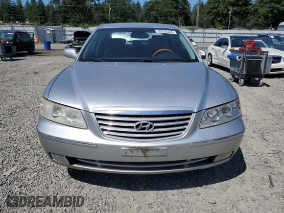 2007 Hyundai Azera SE with VIN KMHFC46F77A241607, listed as a Copart auction lot 59318345 with 198,664 mi miles and Salvage title. Bid and sale history available at DreamBid. Image 5.