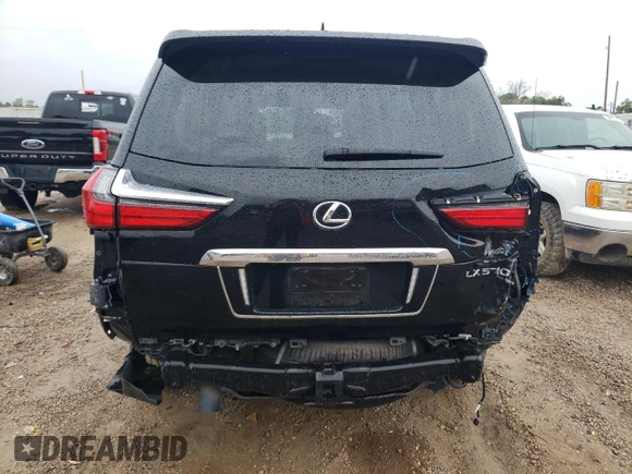 2020 Lexus LX 570 with VIN JTJDY7AX2L4317495, listed as a Copart auction lot 70972864 with 47,283 mi miles and Salvage title. Bid and sale history available at DreamBid. Image 6.