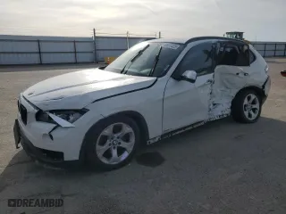 2015 BMW X1 sDrive28i with VIN WBAVM1C58FVZ93621, listed as a Copart auction lot 49897325 with 72,884 mi miles and Salvage Title. Bid and sale history available at carsss.com. Image 1.