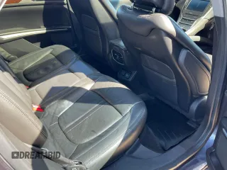 2013 Lincoln MKZ z VIN 3LN6L2GK3DR804377, wystawiony jako Copart lot #62822515 z przebiegiem 167 195 mil mil oraz Czysty tytuł • Clean title. Historia ofert i sprzedaży dostępna na DreamBid. Obrazek 6.