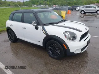 2013 MINI Countryman S ALL4 with VIN WMWZC5C5XDWP31652, listed as a IAAI auction lot 42127716 with 82,601 mi miles and . Bid and sale history available at DreamBid. Image 1.