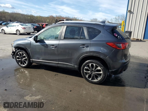 2016 Mazda CX-5 Grand Touring with VIN JM3KE4DY0G0679190, listed as a Copart auction lot 53619495 with 154,649 mi miles and Salvage Title. Bid and sale history available at carsss.com. Image 2.