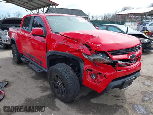 2018 Chevrolet Colorado 4WD Z71 z VIN 1GCGTDEN8J1141945, wystawiony jako IAAI lot #41837680 z przebiegiem 67 686 mil mil oraz . Historia ofert i sprzedaży dostępna na DreamBid. Obrazek 1.