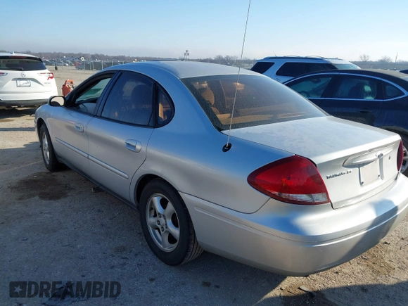 2004 Ford Taurus SE with VIN 1FAFP53U74A125083, listed as a IAAI auction lot 41637777 with 132,100 mi miles and . Bid and sale history available at DreamBid. Image 3.