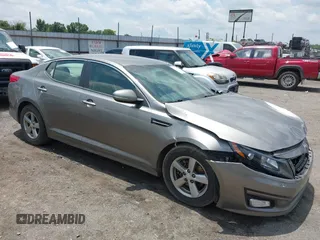 2014 Kia Optima LX with VIN 5XXGM4A7XEG313486, listed as a IAAI auction lot 42517437 with 70,444 mi miles and . Bid and sale history available at DreamBid. Image 1.