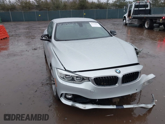 2014 BMW 4 Series 428i with VIN WBA3V5C51EJ968657, listed as a IAAI auction lot 41718019 with 111,083 mi miles and . Bid and sale history available at DreamBid. Image 1.