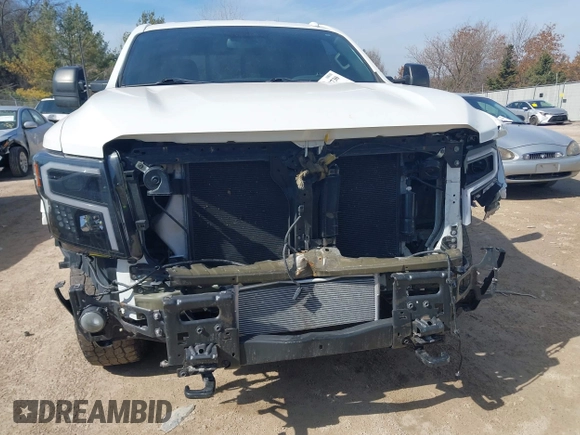 2018 Nissan Titan XD SV with VIN 1N6BA1F40JN523851, listed as a IAAI auction lot 41800730 with 104,527 mi miles. Bid and sale history available at carsss.com. Image 6.