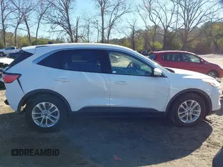 2021 Ford Escape SE Hybrid z VIN 1FMCU0BZ7MUA24481, wystawiony jako IAAI lot #41877750 z przebiegiem 88 656 mil mil oraz . Historia ofert i sprzedaży dostępna na DreamBid. Obrazek 14.