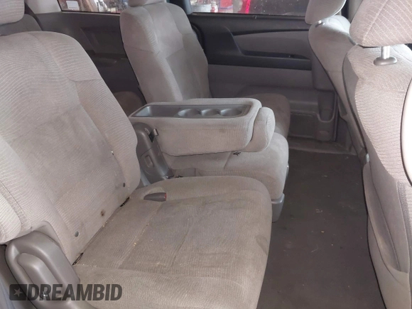 2012 Honda Odyssey EX z VIN 5FNRL5H4XCB017557, wystawiony jako IAAI lot #42367322 z przebiegiem 209 630 mil mil oraz . Historia ofert i sprzedaży dostępna na DreamBid. Obrazek 8.