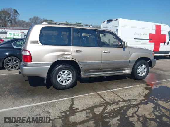 2000 Lexus LX 470 with VIN JT6HT00W8Y0118377, listed as a IAAI auction lot 41787649 with 230,442 mi miles and . Bid and sale history available at carsss.com. Image 13.