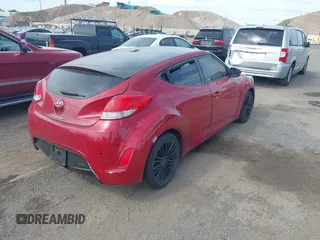 2012 Hyundai Veloster w/Black Int with VIN KMHTC6AD8CU053904, listed as a IAAI auction lot 42774621 with 164,599 mi miles and . Bid and sale history available at DreamBid. Image 4.