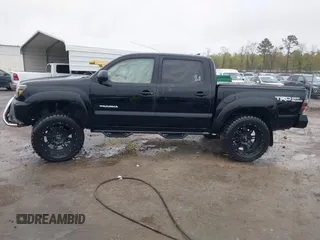 2015 Toyota Tacoma with VIN 3TMLU4EN9FM181683, listed as a IAAI auction lot 41980940 with 176,523 mi miles and . Bid and sale history available at DreamBid. Image 14.