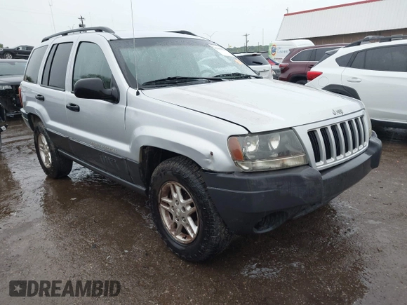 2004 Jeep Grand Cherokee Laredo z VIN 1J4GW48S64C132172, wystawiony jako IAAI lot #42163524 z przebiegiem 170 952 mil mil oraz . Historia ofert i sprzedaży dostępna na DreamBid. Obrazek 1.