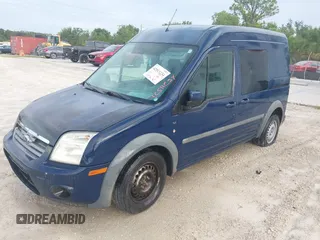 2011 Ford Transit Connect XLT with VIN NM0KS9BN2BT070324, listed as a IAAI auction lot 42511234 with 297,422 mi miles and . Bid and sale history available at DreamBid. Image 2.