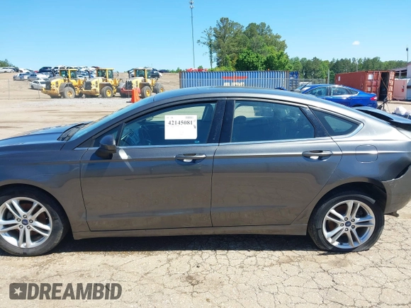 2018 Ford Fusion SE z VIN 3FA6P0H71JR155221, wystawiony jako IAAI lot #42145081 z przebiegiem 189 367 mil mil oraz . Historia ofert i sprzedaży dostępna na DreamBid. Obrazek 15.
