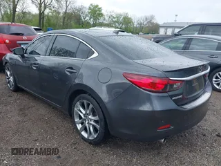 2014 Mazda 6 i Grand Touring с VIN JM1GJ1W66E1141962, выставлен на аукционе IAAI как лот 42119753 с пробегом 187 514 миль миль и . История ставок и продаж доступна на DreamBid. Изображение 3.