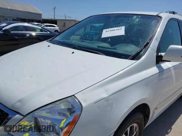 2014 Kia Sedona EX with VIN KNDMH4C76E6554982, listed as a IAAI auction lot 41980362 with 164,380 mi miles and . Bid and sale history available at DreamBid. Image 6.