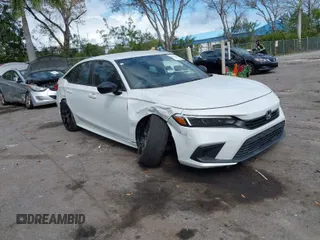 2022 Honda Civic Sedan Sport with VIN 2HGFE2F52NH532042, listed as a IAAI auction lot 41594967 with 76,809 mi miles. Bid and sale history available at carsss.com. Image 1.