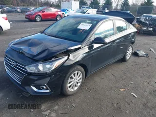 2022 Hyundai Accent SE with VIN 3KPC24A61NE170710, listed as a IAAI auction lot 40869215 with 28,459 mi miles. Bid and sale history available at carsss.com. Image 2.