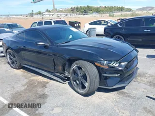 2021 Ford Mustang GT z VIN 1FA6P8CF4M5149580, wystawiony jako IAAI lot #41878355 z przebiegiem 60 028 mil mil oraz . Historia ofert i sprzedaży dostępna na DreamBid. Obrazek 1.