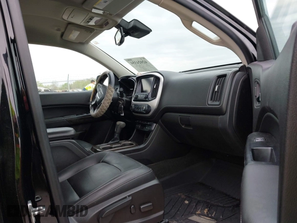 2016 GMC Canyon 4WD SLT z VIN 1GTG6DE36G1374639, wystawiony jako IAAI lot #42024354 z przebiegiem 61 752 mil mil oraz . Historia ofert i sprzedaży dostępna na DreamBid. Obrazek 5.