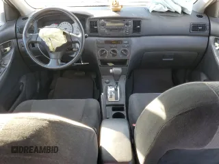 2003 Toyota Corolla CE with VIN 1NXBR32E13Z155142, listed as a Copart auction lot 79714184 with 299,999 mi miles and Salvage Title. Bid and sale history available at DreamBid. Image 8.