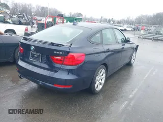 2015 BMW 3 Series 328i Gran Turismo xDrive with VIN WBA3X5C5XFD562161, listed as a IAAI auction lot 41570204 with 71,405 mi miles and . Bid and sale history available at DreamBid. Image 4.