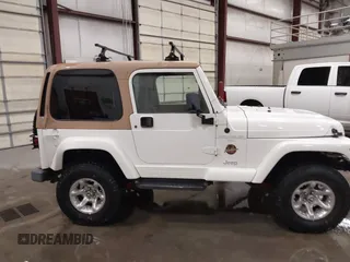 1997 Jeep Wrangler Sahara with VIN 1J4FY49S3VP529837, listed as a IAAI auction lot 41752978 with 138,024 mi miles. Bid and sale history available at carsss.com. Image 13.