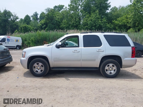 2013 Chevrolet Tahoe LT with VIN 1GNSCBE06DR320906, listed as a IAAI auction lot 42505492 with 161,162 mi miles and . Bid and sale history available at DreamBid. Image 15.