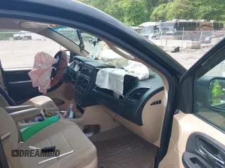 2014 Dodge Grand Caravan SXT z VIN 2C4RDGCGXER267110, wystawiony jako IAAI lot #42251423 z przebiegiem 146 198 mil mil oraz . Historia ofert i sprzedaży dostępna na DreamBid. Obrazek 5.