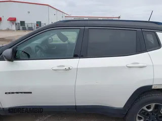 2018 Jeep Compass Trailhawk with VIN 3C4NJDDB7JT144431, listed as a IAAI auction lot 41629703 with 122,079 mi miles and . Bid and sale history available at carsss.com. Image 14.